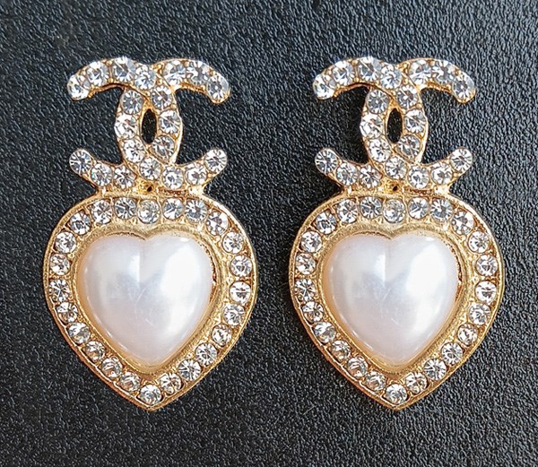 CC OHRRINGE MIT STRASS in Herzform